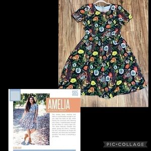 Lularoe women dress Large 14 16 fit flare pockets dark floral bird Amelia black